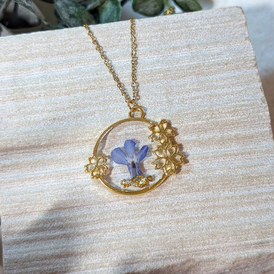 Gold Plated Blue Lobelia Necklace with Classic Flowered Frame – A Timeless Symbol of Tranquility & Harmony