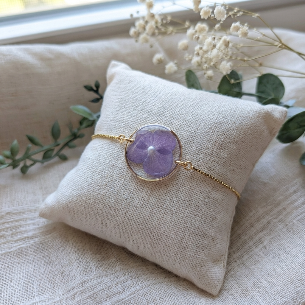 Purple hydrangea 20mm flat bracelet with imitation pearl on jewellery display stand, handmade real flower jewellery by Work by Nature