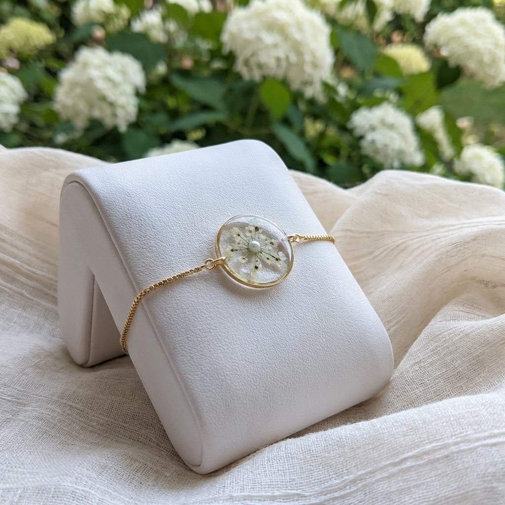 Queen Anne’s Lace 20mm flat bracelet on jewelry display stand, handmade real flower jewelry by Work by Nature