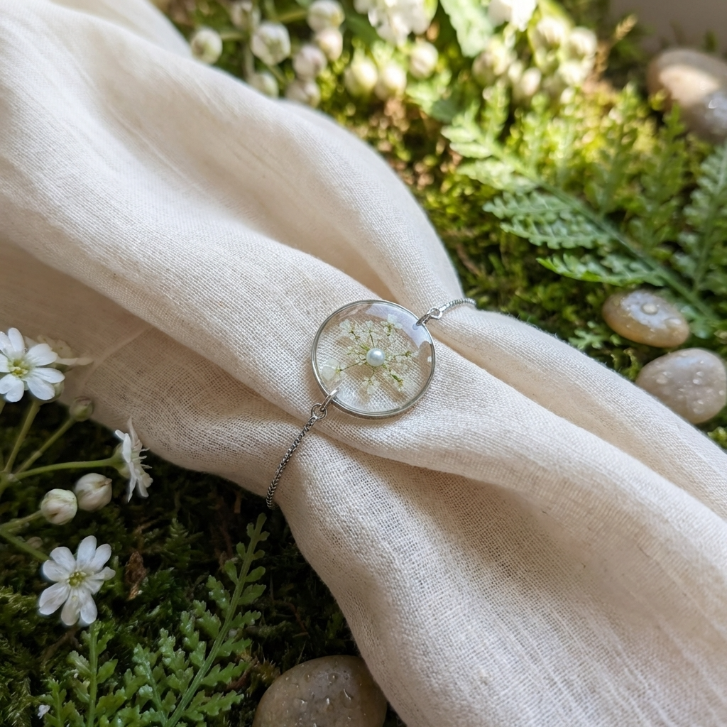 Queen Anne’s Lace 20mm flat bracelet on jewellery display stand, handmade real flower jewellery by Work by Nature